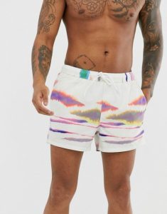 Swimwear trends 2020 ASOS DESIGN swim shorts in white tie-dye and contrast drawcord in short length CREDIT ASOS