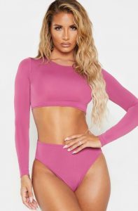 Swimwear trends 2020 PrettyLittleThing Pink High Neck Long Sleeve Bikini CREDIT PrettyLittleThing
